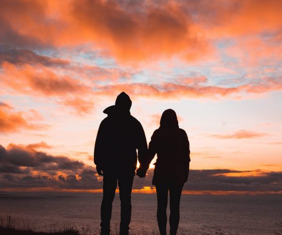 Couple holding hands